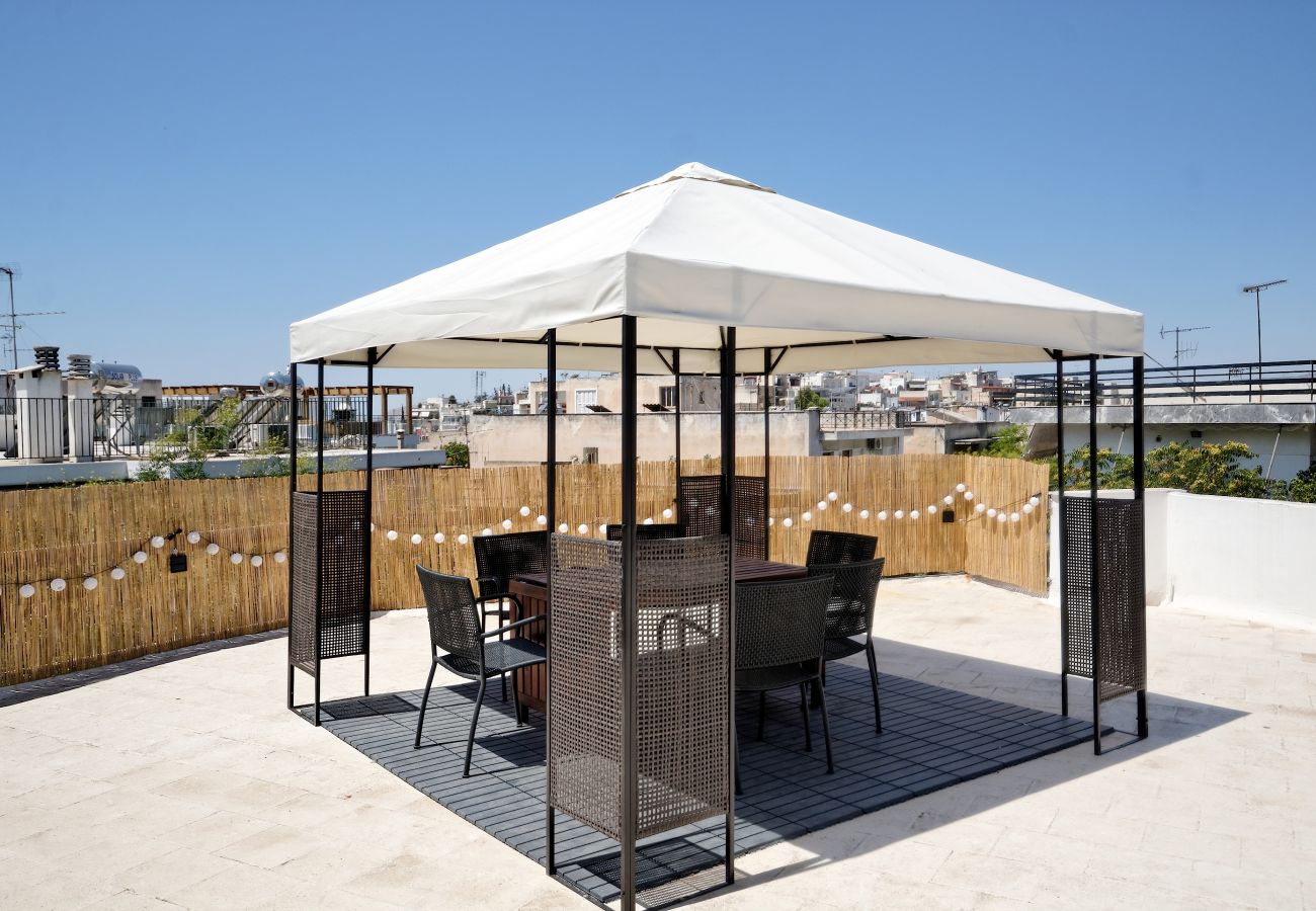 Apartment in Athens - Muses Residence Erato, Stylish & Artistic Apartment in the Koukaki Neighborhood with BBQ and terrace with Gazebo in Common Rooftop