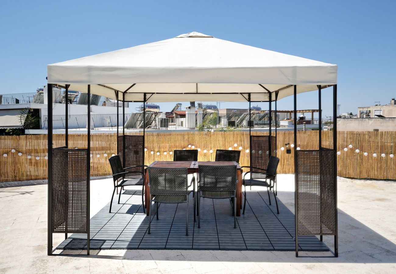 Apartment in Athens - Muses Residence Erato, Stylish & Artistic Apartment in the Koukaki Neighborhood with BBQ and terrace with Gazebo in Common Rooftop