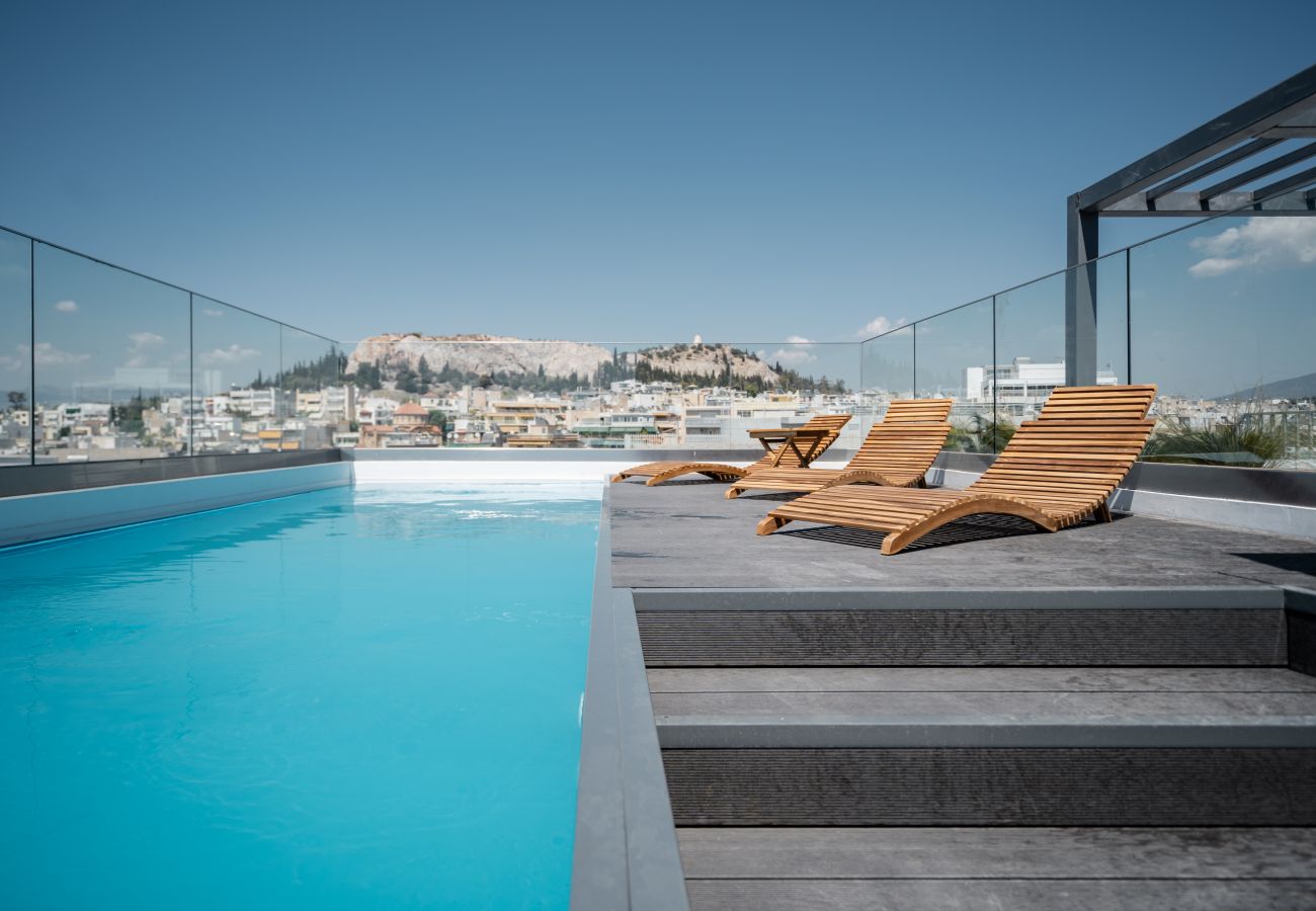 Apartment in Kallithea - “The Edge” Athens Escape With Rooftop Pool & Gym