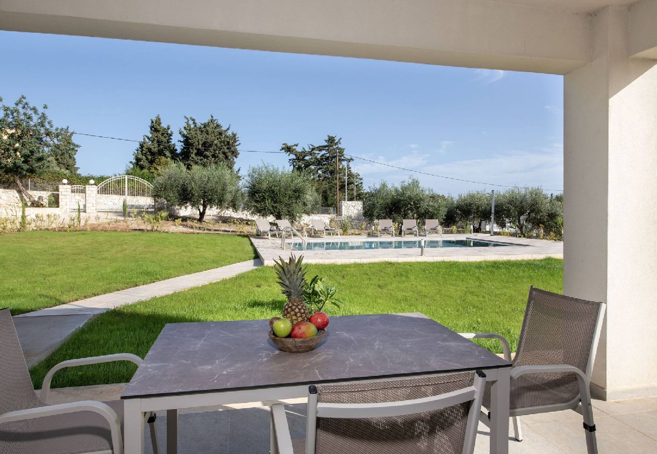 Outdoor dining terrace at villa near Almyrida Chania