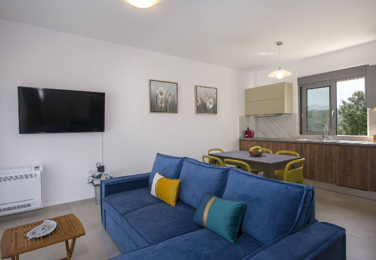 Open plan living room and kitchen in villa near Almyrida Chania