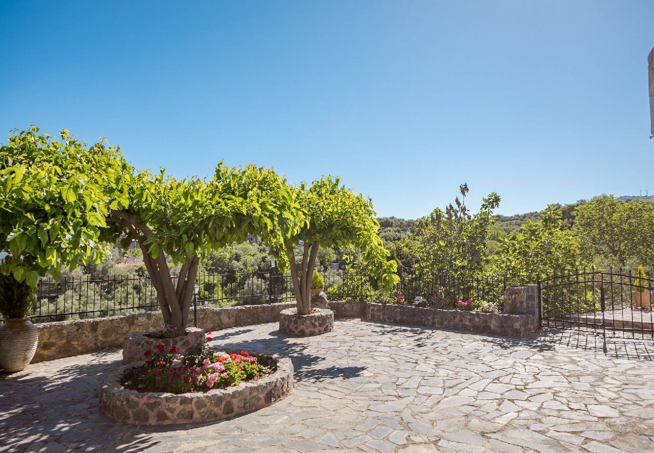 Outdoor dining terrace at Halases Panorama Villa Alikampos Crete