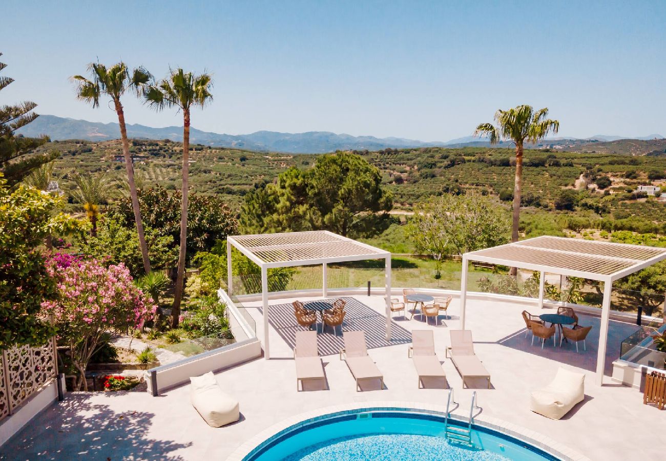Terrace view of shared pool at maisonette in Xamoudochori Crete