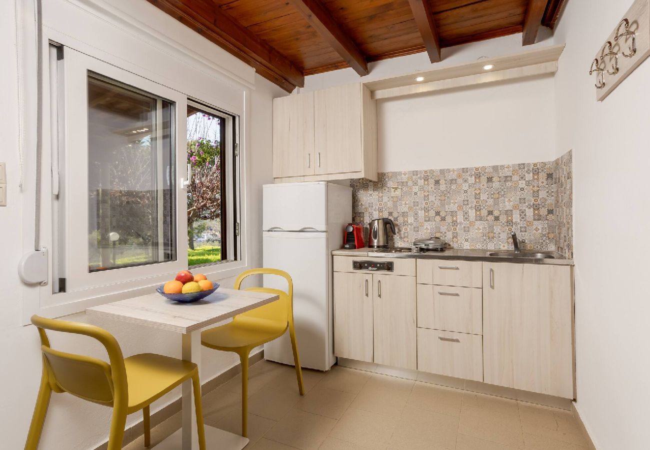 Living room and kitchenette in Xamoudochori maisonette Crete