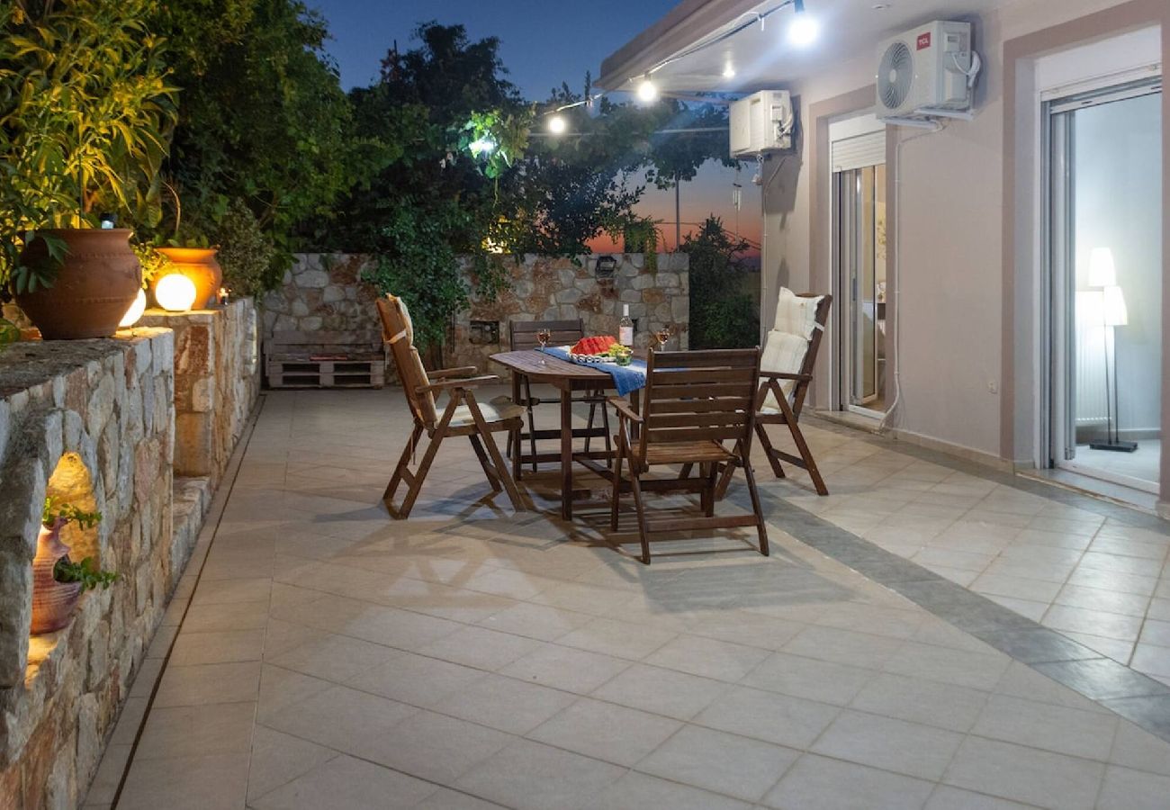 Outdoor dining terrace at apartment in Kounoupidiana Chania