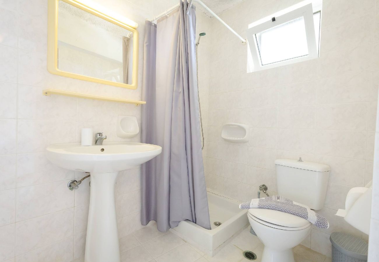 Bathroom with walk-in shower in Crete ground floor studio