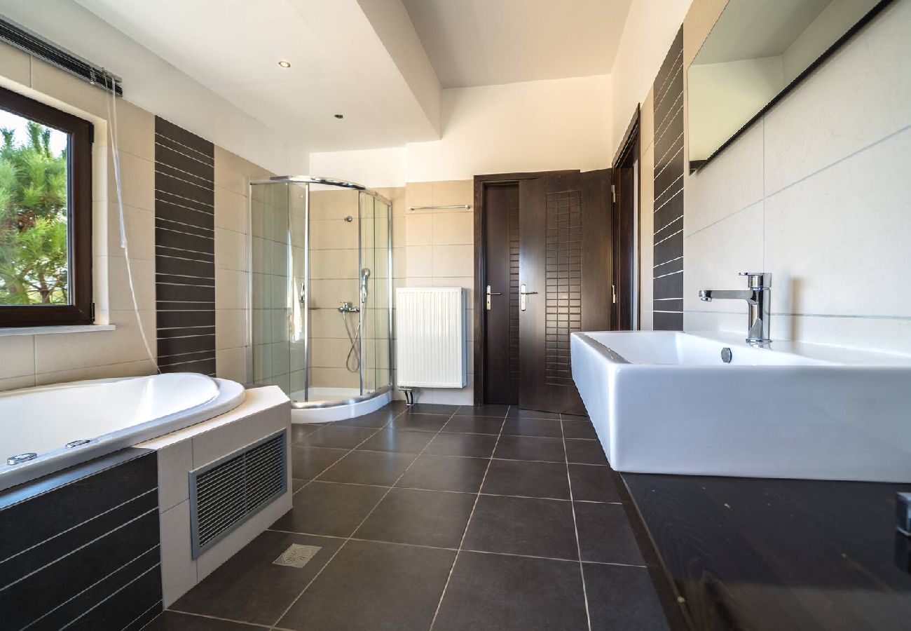 Indoor jacuzzi bathroom in Souda Bay villa Crete